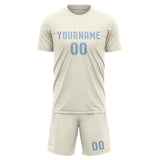 Custom Cream Light Blue Soccer Jersey