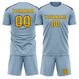 Custom Light Blue Gold Soccer Jersey