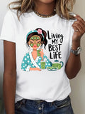Womens T Shirts Living My Best Life Cheerful Woman With Green Face Mask And Refreshing Lime Drink Tshirt, Womens Graphic Tshirts, Shirt For Women