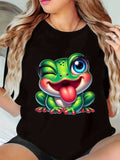 Black T Shirt Women Playful Green Cartoon Frog Tongue Out Sitting, Womens Graphic T Shirts, Womens Tees