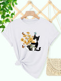 Cute Graphic Tees For Women Black And White Cat Sitting Among Yellow Flowers With Colorful Butterflies Cat, Vintage Shirts Women, Womens T Shirts