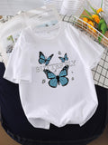 Cute Graphic Tees For Women Blue Butterflies With Delicate Wings Fluttering Over Printed Tshirt, Womens White Tee, Women Tshirts