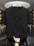 Men's T-Shirt Curious Green Eyed Black Cat Peeking Over Solid Black Cotton T Shirt