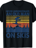 Men's T-Shirt Never Underestimate An Old Man Skiing Silhouette Among Mountains And Sunset Skis