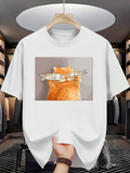 Men's T-Shirt Playful Orange Cat With Whimsical Fishes Balanced On Nose Cat