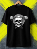 Men's T-Shirt Grinning Skull Lifting Heavy Weights With Determined Energy Barbell Skull