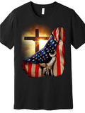 Men's T-Shirt Dramatic Sunlit Cross With Waving American Flag Draped Over Powerful Hand