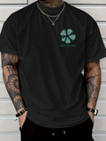 Men's T-Shirt Green Clover Emblem Under Soft Light On Casual Tee