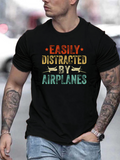 Men's T-Shirt Easily Distracted By Airplanes Bold Colored Letters With Airplane Icons Black Shirt
