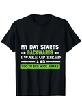 Men's T-Shirt My Day Starts Backwards I Wake Up Tired And I Go To Bed Wide Awake Contrasting Lettering On Black Cotton T Shirt Front