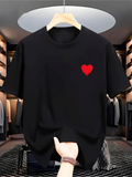 Men's T-Shirt Minimalist Red Heart Graphic Centered On Soft Black Fabric T Shirt