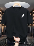 Men's T-Shirt Soft White Feather Floating On Minimalist Black Fabric T Shirt