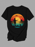 Men's T-Shirt Sunset Glow With Fisherman And Birds Standing By The Tranquil Water
