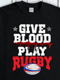 Men's T-Shirt Give Blood Play Rugby With Blood Splatter And Rugby Ball