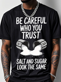 Men's T-Shirt Be Careful Who You Trust Spilled White Powdery Substance From Containers With Text Salt And Sugar