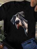 Women's T-Shirt Playful Cartoon Style Big Eyed Dog Under Gentle Light