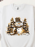 Women's T-Shirt Snow Covered Trees With Golden Leaves Surrounding A Smiling Snowman