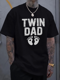Men's T-Shirt Twin Dad Playful Baby Footprints With Bold Fun Typography T Shirt