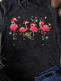 Men's T-Shirt Cheerful Festive Lights And Santa Hats On Playful Flamingo