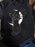 Women's T-Shirt Silent Night With Moonlit Shadows And Mystical Witch Hat Cat