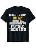 Men's T-Shirt Legendary Tire Guy Among Stacked Tires Bold Statement Black Shirt