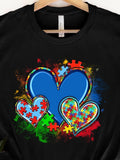 Men's T-Shirt Colorful Painted Puzzle Pieces Surrounding Three Big Hearts