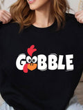 Women's T-Shirt Gobble Cartoon Turkey Face With Playful Red Beak On Black Shirt Turkey