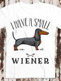 Men's T-Shirt I Have A Small Wiener Black Brown Cartoon Dachshund Standing Over Bones