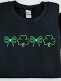 Men's T-Shirt Green Shamrock Clovers With Festive Ribbon Bows Under Springtime Light