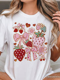 Women's T-Shirt Pink Ribbons With Heart Shaped Flowers Surrounding Colorful Strawberries