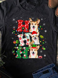 Men's T-Shirt Smiling Corgis Wearing Festive Holiday Hats Surrounded By Christmas Lights