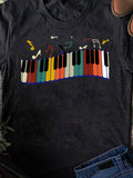 Men's T-Shirt Colorful Notes Dancing Above Rainbow Piano Keyboard