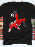 Men's T-Shirt Dynamic Santa Kicking A Soccer Ball In Midair