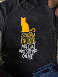 Men's T-Shirt Sorry Im Late Playful Orange Cat Sitting On Cozy Black T Shirt