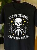 Men's T-Shirt Stand Strong Among Yellow Stars With Raised Bones Skeleton