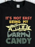 Men's T-Shirt Its Not Easy Being My Wifes Arm Candy Colorful Bold Typography With Banner And Flexed Arms