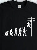Men's T-Shirt Evolution Of Human Climbing Utility Pole Under Black Sky