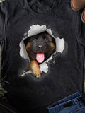 Men's T-Shirt Playful Fluffy Puppy Emerging Through Torn Paper Wall