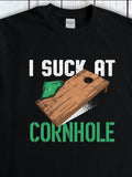 Men's T-Shirt I Suck At Cornhole Distressed Wooden Board With Green Bean Bag Game Cornhole