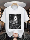 Men's T-Shirt Dramatic Nighttime Scene With UFO Beaming Cows Above Surprised Cat