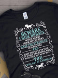 Men's T-Shirt Beware I Ride Horses Surrounded By Vintage Ornaments And Grazing Horse Silhouette