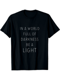 Men's T-Shirt In A World Full Of Darkness Be A Light Minimalist Lettered Slogan Surrounded By Black Fabric T Shirt