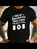 Men's T-Shirt Not All Superheroes Wear Capes Some Are Just Named Bob Bold Typography On Black Shirt