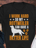 Men's T-Shirt I Work Hard So My Rottweiler Can Have A Better Life Loyal Dog With Paw Prints Under White Silhouette