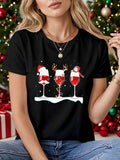 Women's T-Shirt Christmas Characters With Snow And Sparkling Red Wine Glasses