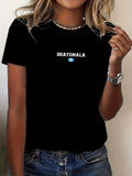Women's T-Shirt Bold Lettering With Small Flag Centered Over Black T Shirt