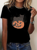 Women's T-Shirt Mysterious Halloween Night With Cat Resting On Pumpkin