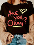 Women's T-Shirt Are You Okay Handwritten Letters With Doodle Heart On Black Shirt