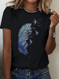 Women's T-Shirt Blue Feather Transforming Into Birds In Gentle Black Breeze