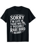 Men's T-Shirt Sorry I Am Late There Was A Possible Rare Bird Nearby Monochrome Bird Illustration With Playful Lettering On Black T Shirt